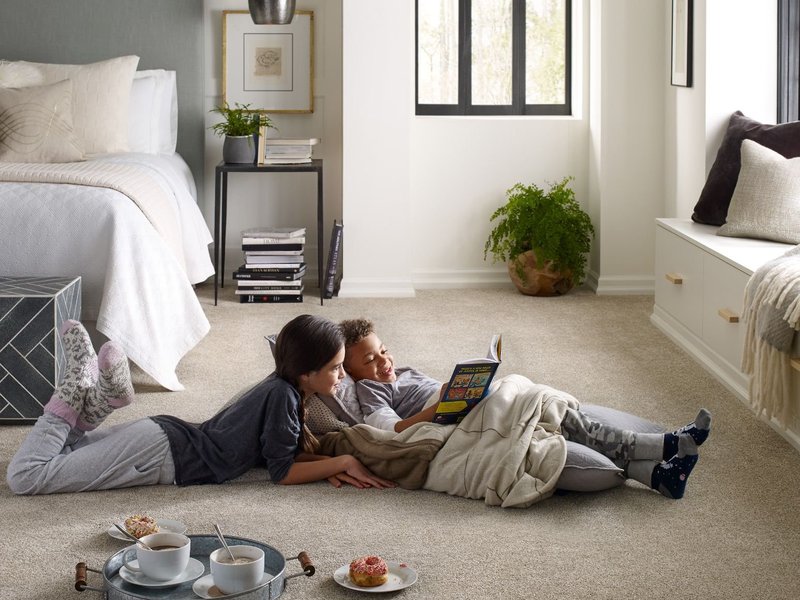 Kids reading on bedroom carpet from Carpet & Flooring By Denny Lee in Abingdon, MD