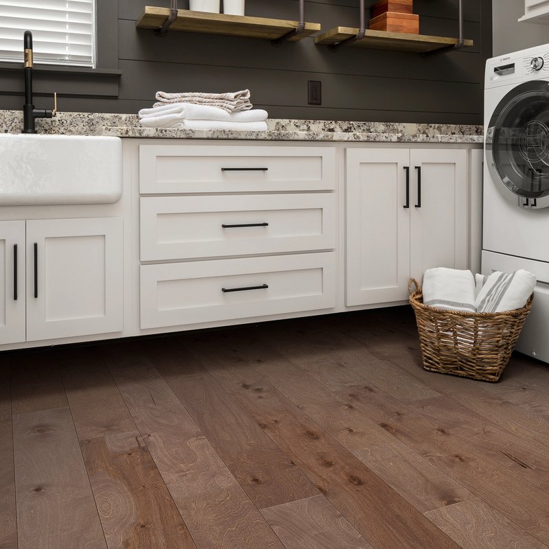 Kitchen with a basket of laundry on hardwood flooring from Carpet & Flooring By Denny Lee in Abingdon, MD